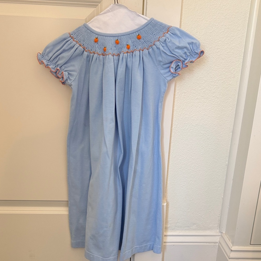 Light Blue Smocked Girls' Dress with Orange Accent